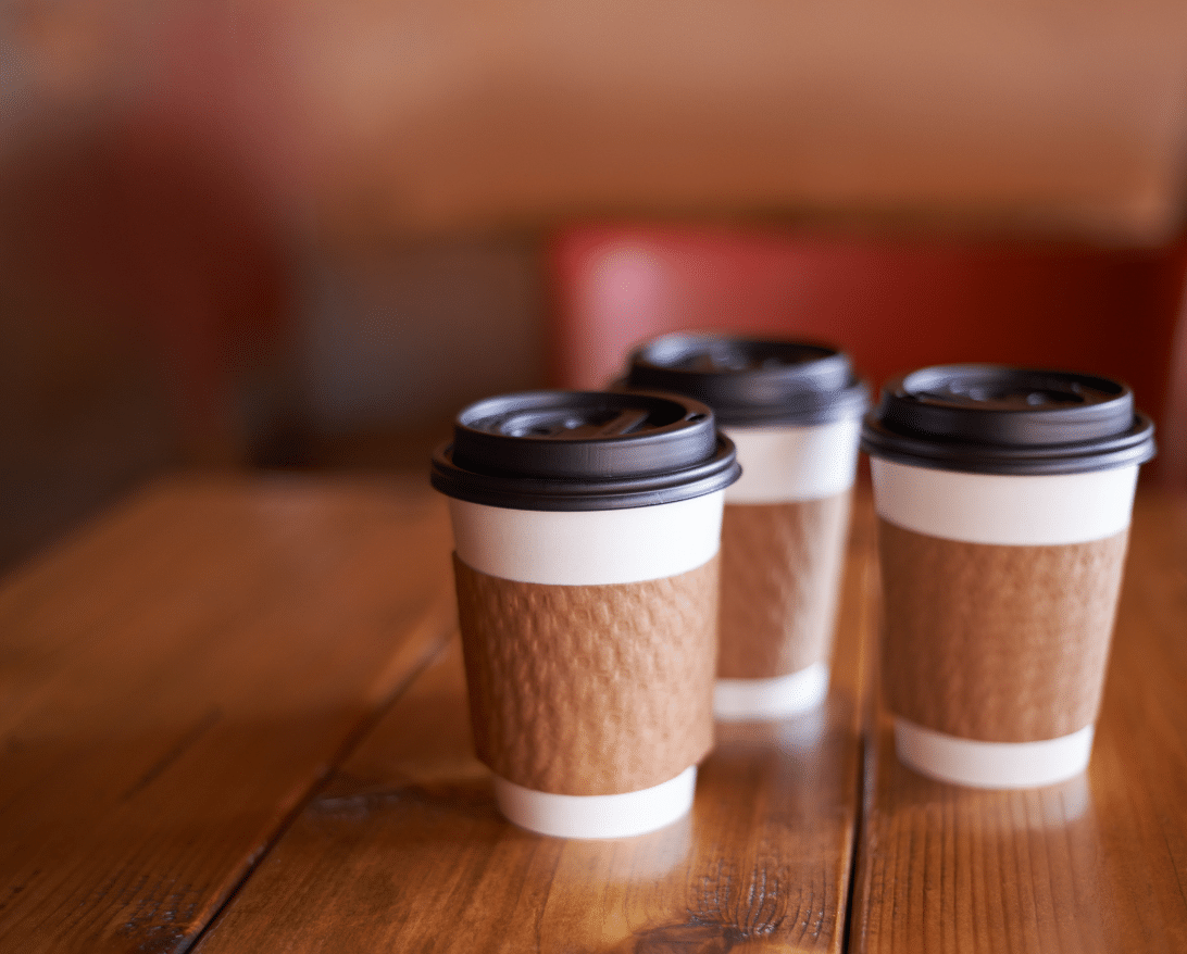 beverage delivery; coffee to-go cups on a table