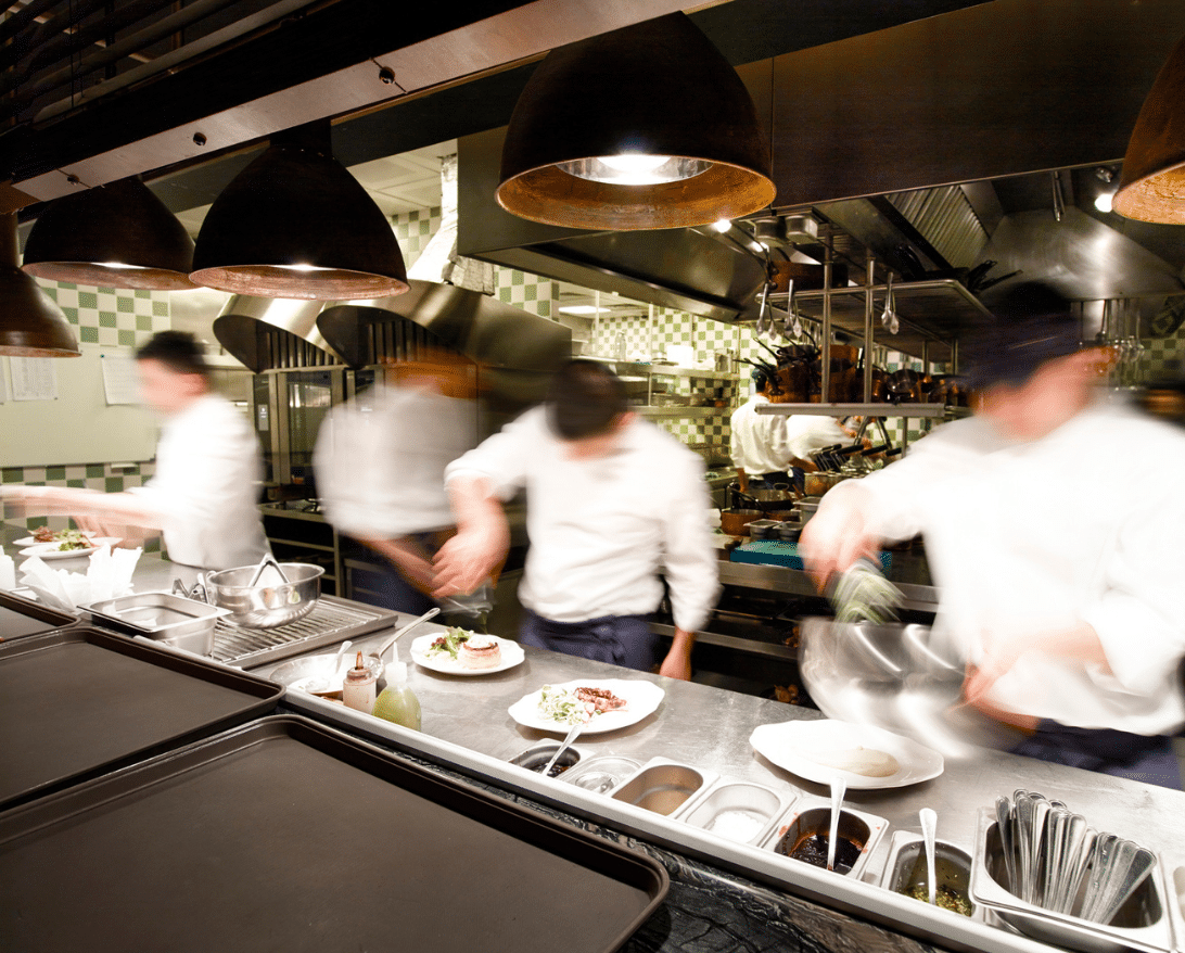 Restaurant workers preparing food for a virtual restaurant