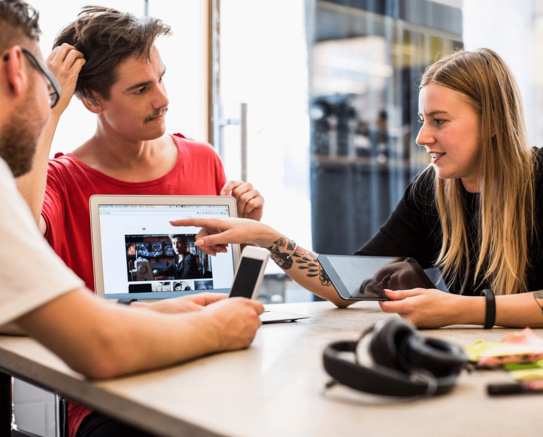 team of people building a customized restaurant site on grubhub direct