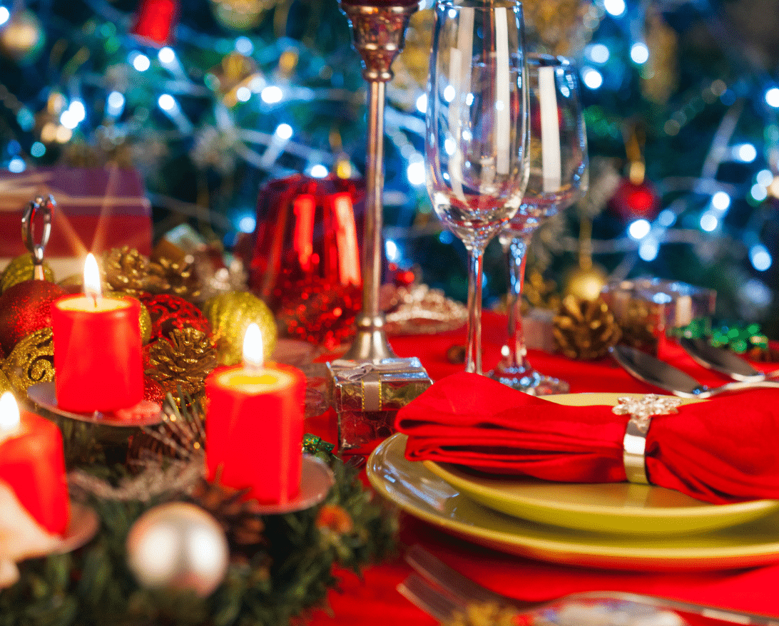 A restaurant table is set up for the holidays