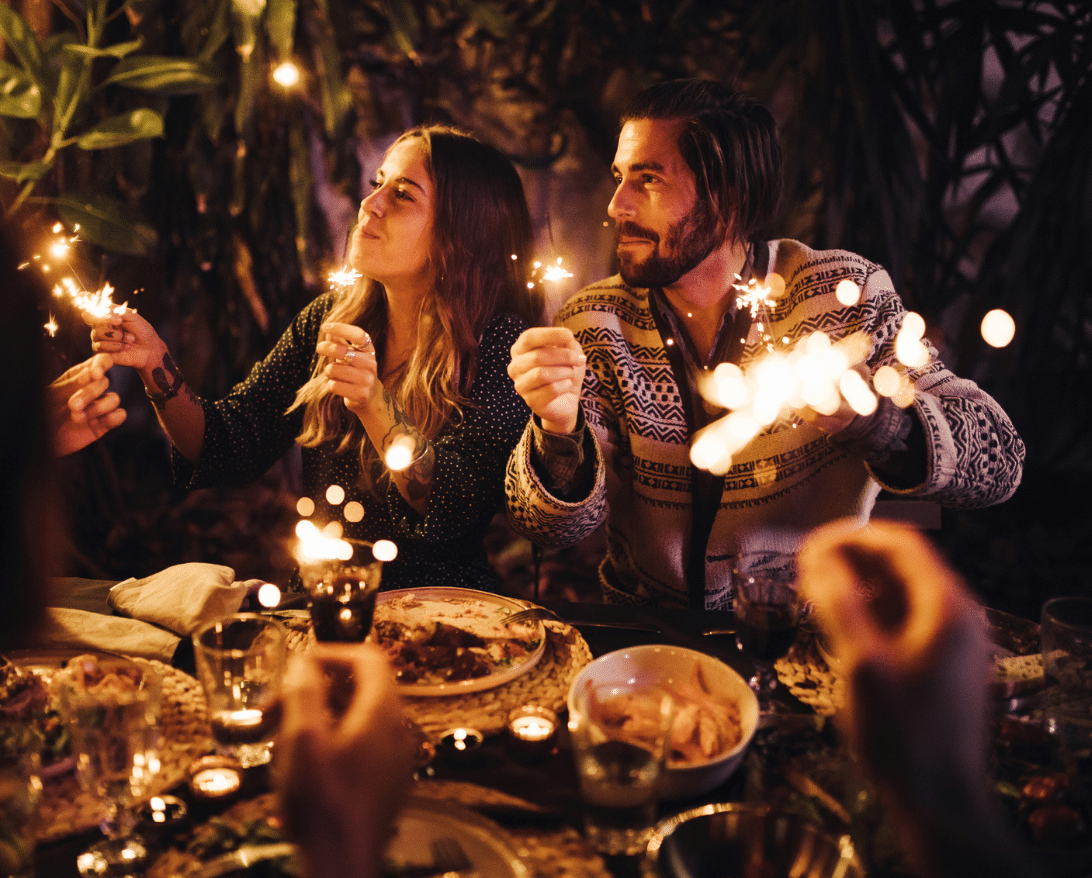 Diners use sparklers at the dinner table.
