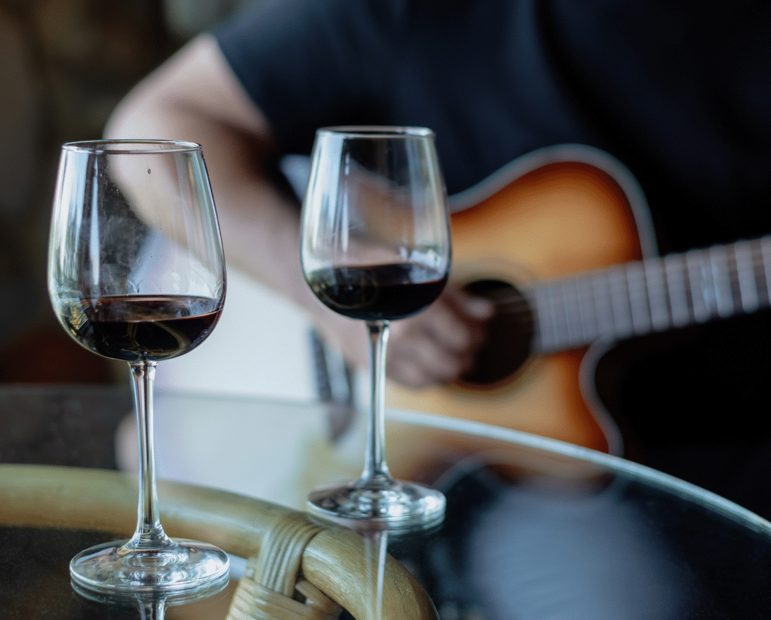 A musician plays music at a restaurant.