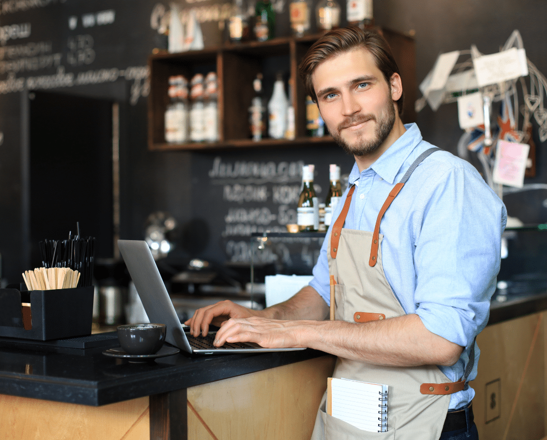A man looks through websites for restaurants