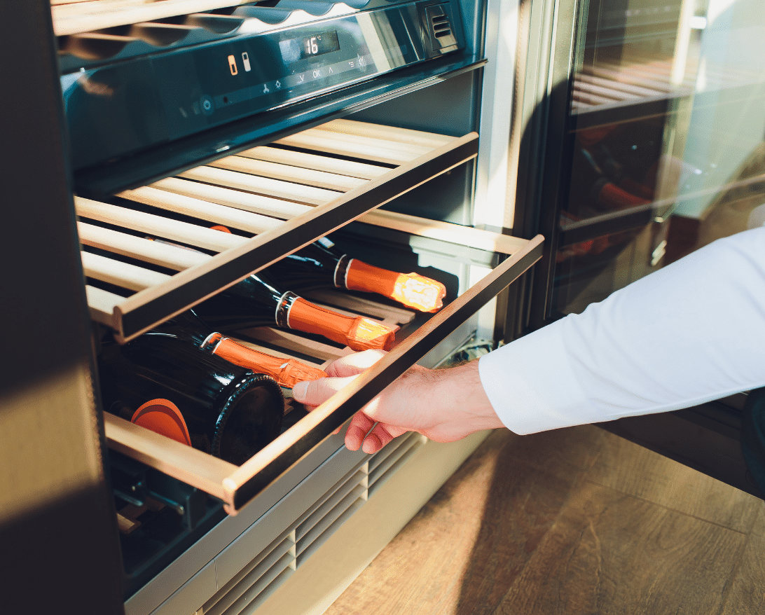 Wine is stored in a fridge.