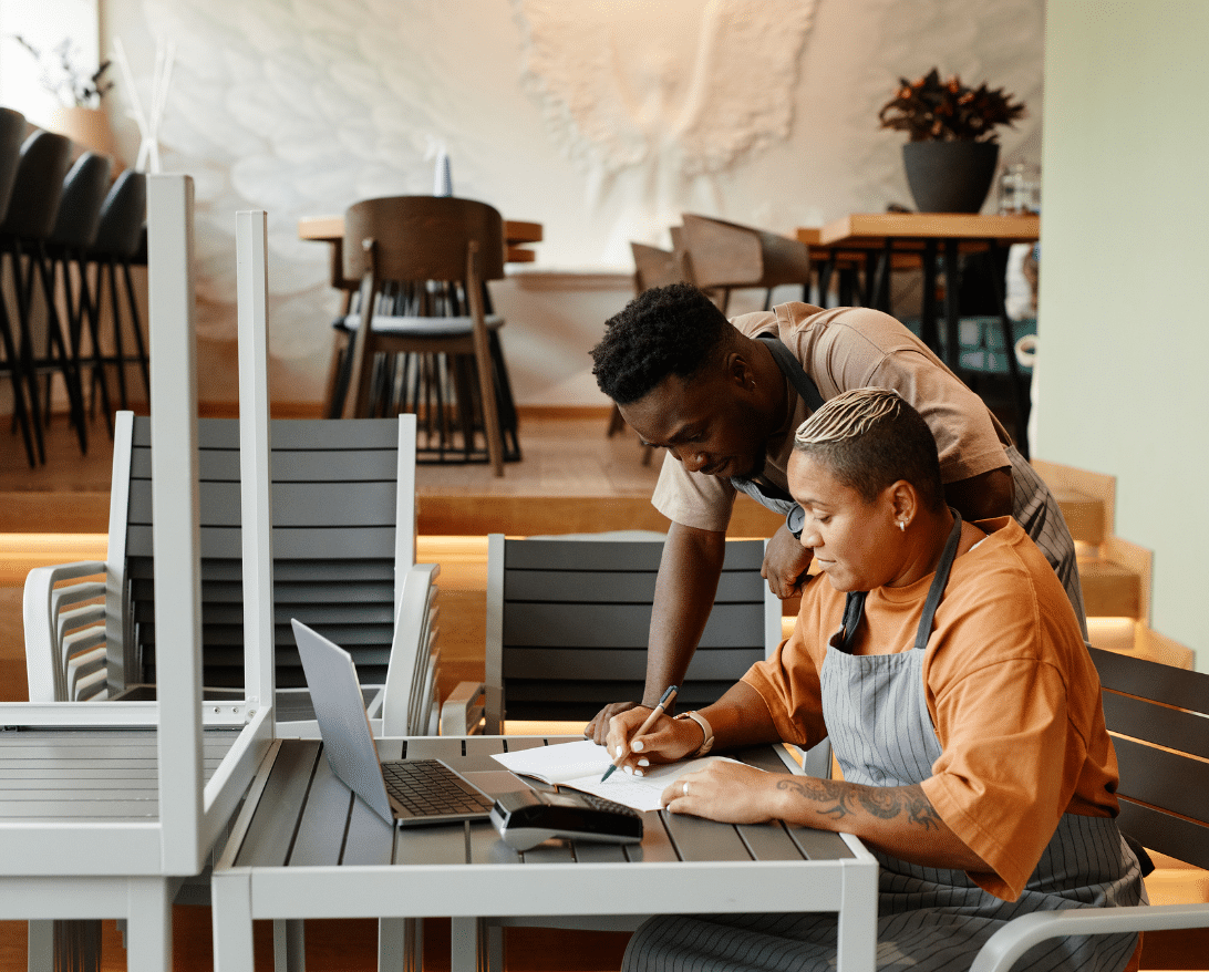 An employee checks on restaurant finances