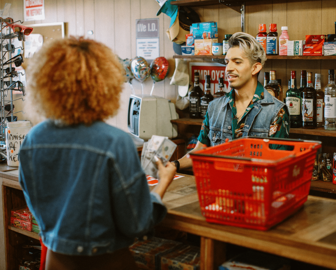 A customer checks out at a convenience store