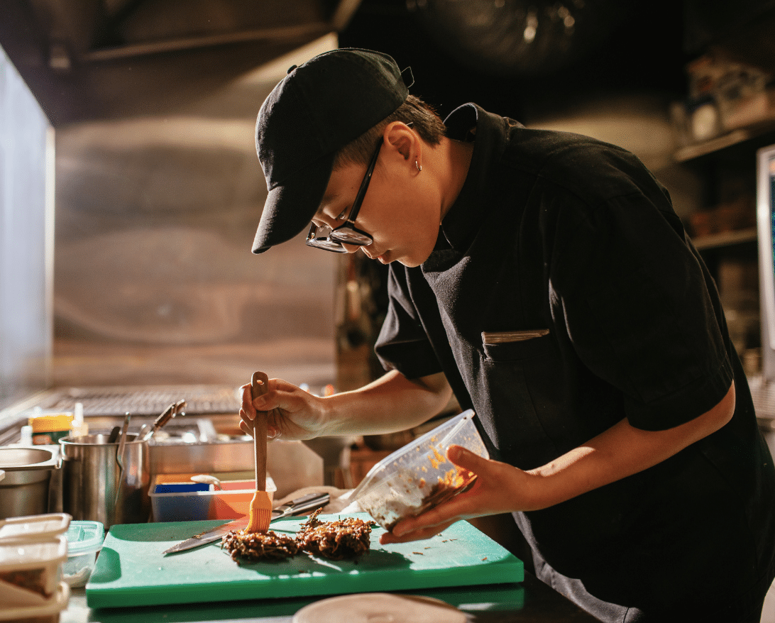 A chef works at a successful restaurant