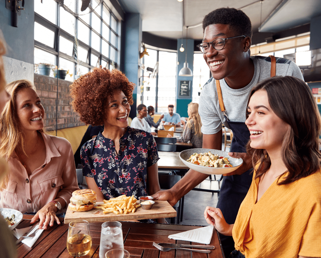 A waiter follows customer service guidelines